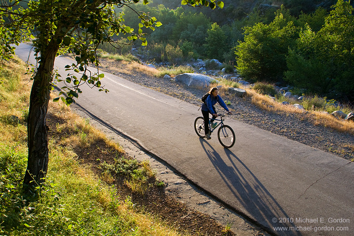 A bicycle rider enjoys a late afternoon ride along the West Fork National Scenic Bikeway Trail, San Gabriel River, San Gabriel...