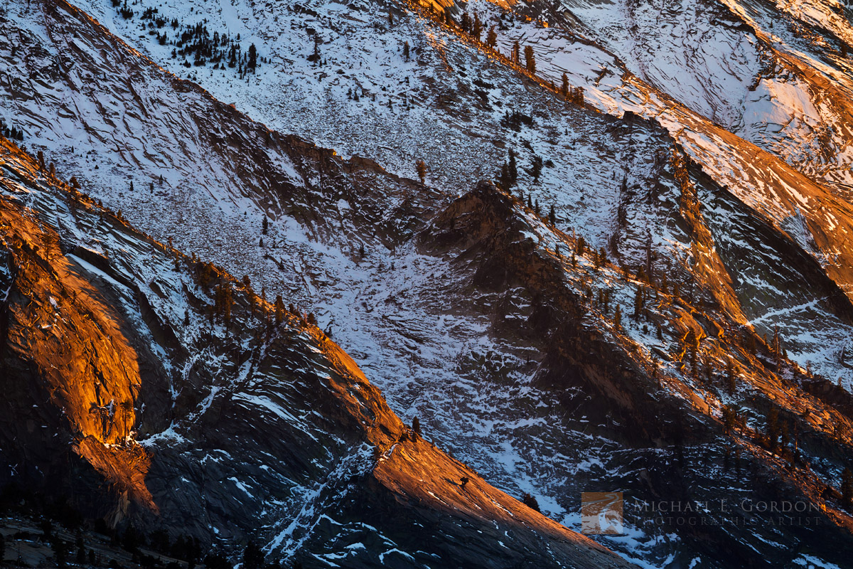 New snow and brilliant golden light at sunset on&nbsp;the west face of Clouds Rest. Logos and watermarks are not found on any...