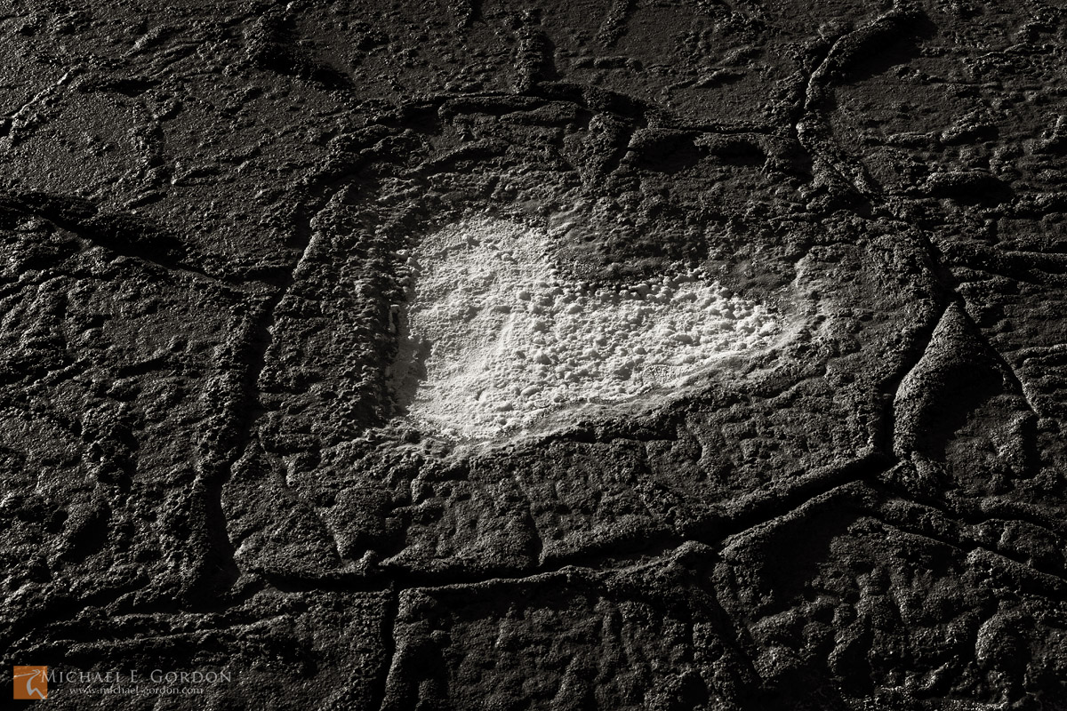 A naturally occurring heart-shaped design in the mud and salt of Cottonball Basin, Death Valley National Park.