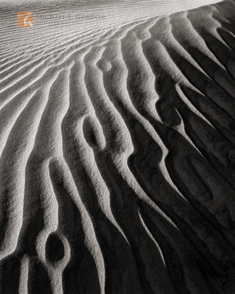 Wind sculpted sand dunes.&nbsp;Logos and watermarks are not found on any printed product. This feature is for online copyright...