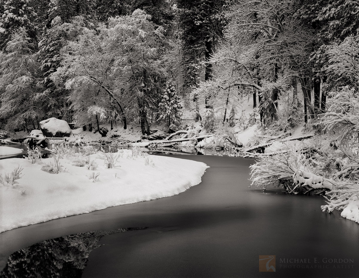 A quiet winter scene along the Merced River in&nbsp;Yosemite Valley.Logos and watermarks are not found on any printed product...