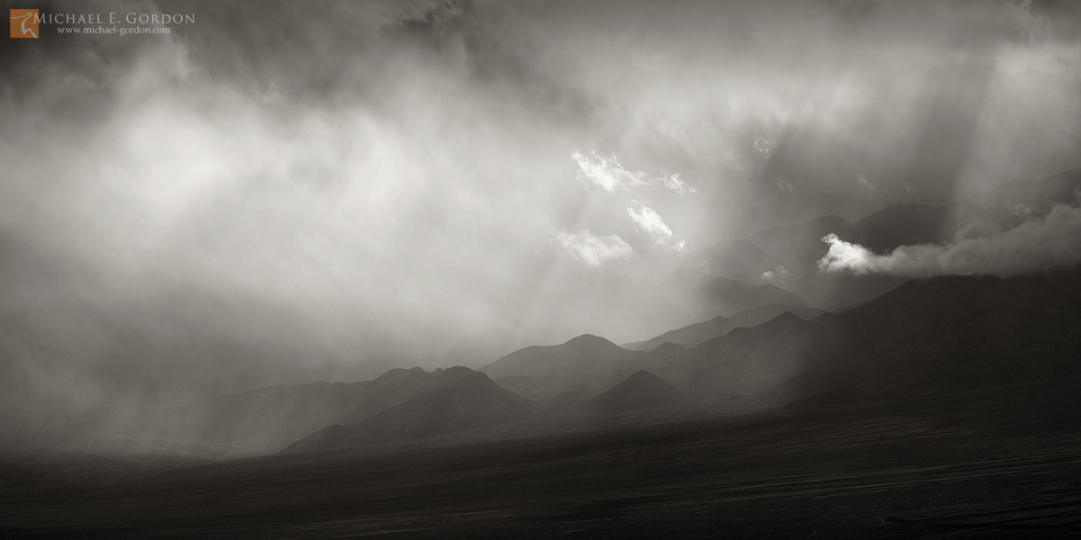 Light, cloud, and wind converge on Death Valley's Panamint Mountains.