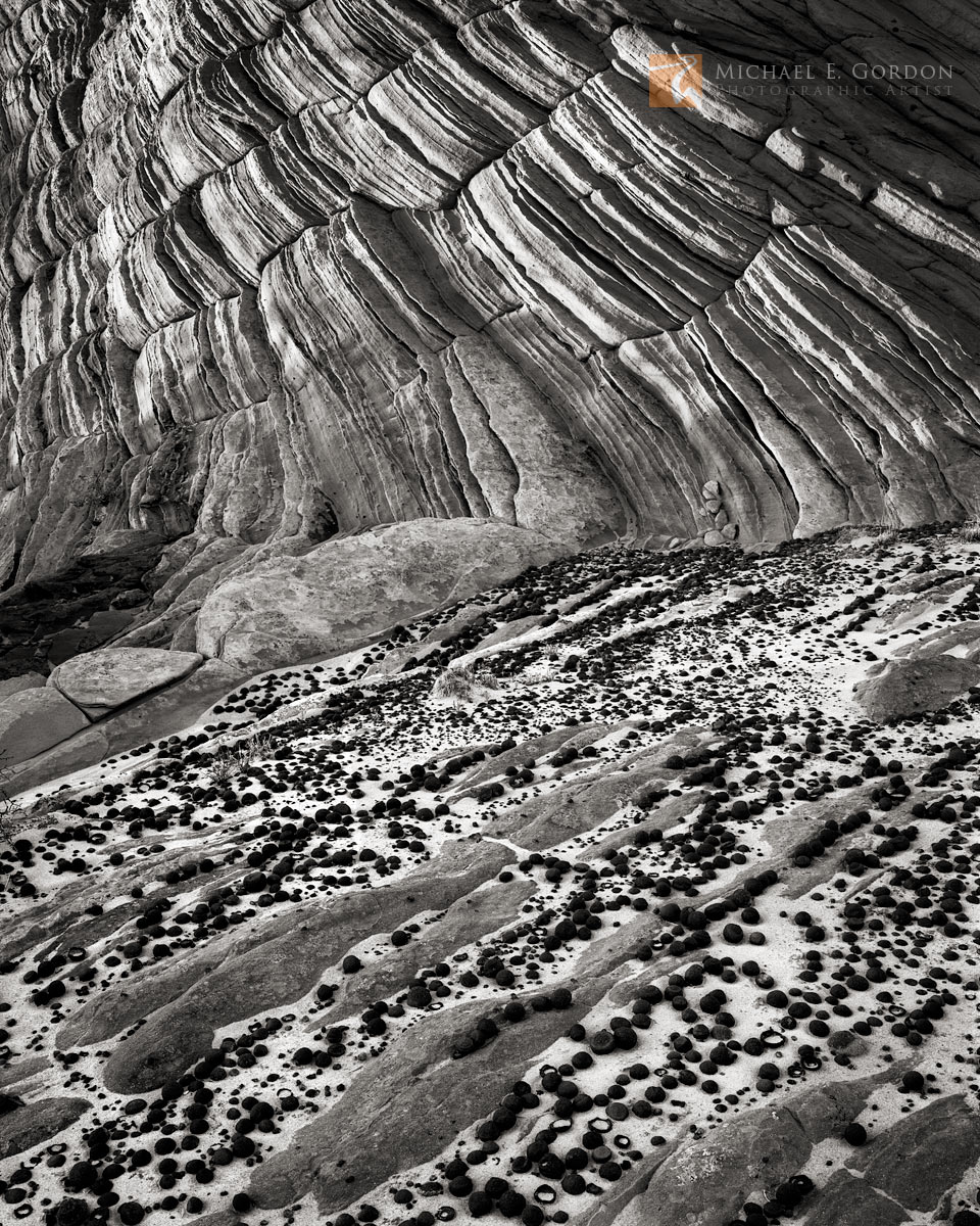 Natural Navajo sandstone and hematite concretions&nbsp;known as Moqui Marbles gather in sand-filled channels and flats.&nbsp;...